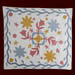 Pastel Appliqu&eacute; Crib Quilt